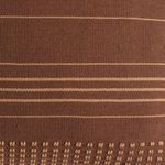 Extreme close-up of woven cotton threads showing detailed stripe and dot pattern texture