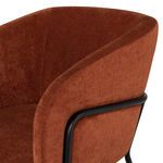Close-up of textured terra cotta polyester fabric and black metal curved backrest frame