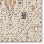 Close-up of corner medallion showing intricate Ottoman-inspired motifs in blue, rust, and gold tones