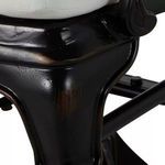 Close-up of curved front leg and cushion edge on swivel rocker chair