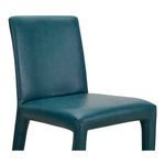 Close-up of Monte Dining Chair seat and backrest stitching detail on teal vegan leather