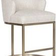 Charley Barrel Base Stool angled view showing thick cushioned seat and brass-finished semi-circular base