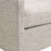 Detailed view of lower arm and base with herringbone pattern fabric texture on slipcover