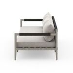 Close-up side profile focusing on texture of Sunproof fabric cushions and teak frame grain