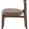 Side view showing slim profile, tapered legs, and smooth leather seat of the chair