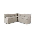 Modular slipcovered L-shaped dining banquette in neutral flax linen with flanged top seams and feather-blend cushions