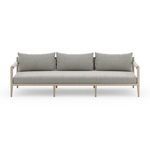 Front angle with even lighting highlighting fabric texture and linear teak legs