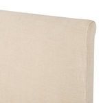 Black fabric underside dust ruffle attached to Dalia Bed's back panel