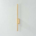 Bernard Wall Sconce full side view showing slim profile and soft shadow on light grey wall