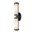 Bowland Bath Wall Sconce angled view lit, highlighting bronze finish and glowing glass tubes
