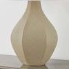 Faceted gourd-shaped ceramic base in beige with glaze highlighting edges, no lampshade