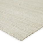 Close-up angled view showing tight weave texture and finished edge binding of the rug