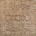 Traditional area rug with vintage-inspired mottled brown, tan, and cream faded design and variable-pile texture