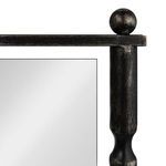 Close-up of Antique metal frame corner with textured turned details and round ball finial on Vintage Elegance Mirror