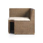 Natural woven rattan bench corner armrest with beige cushion beneath