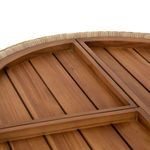 Close-up showing wooden planks and woven rattan meeting at base edge