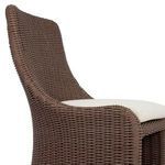 Close-up angle of the backrest curve and cushioned seat edge revealing tight weave detail