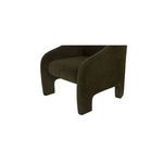 Close-up detail of curved armrest and leg area of Tuva Accent Chair in cedar-green velvet