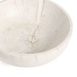 Close-up showing wood grain and natural cracks inside the bowl