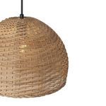 Close-up of woven texture and light glowing softly through the natural material