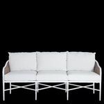 Front view of Havana Euro outdoor sofa showing three white seat cushions and cane arm panels