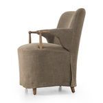 Side angle showing smooth flax linen fabric wrapping around the seat of Brently Dining Chair
