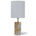 Mini cylinder table lamp with solid jade stone base in white and amber hues, natural brass hardware, and tall natural line...