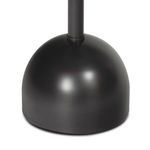 Detailed view of the matte black goblet-shaped steel base with smooth finish