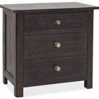 Driftwood three-drawer nightstand in Burnt Timber finish with brass knobs and sturdy square legs