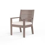 Laguna Dining Chair in hand-brushed aluminum with driftwood finish and beige seat cushion