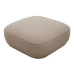 Marion Square Ottoman angled view showing curved edges and piping detail on beige fabric