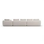 Back view displaying fully upholstered smooth ivory fabric and clean rounded edges