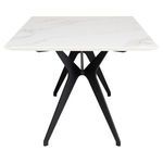 End view highlighting angled black metal legs and thickness of white ceramic table top