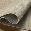 Folded corner displaying rug's flexible polyester pile and woven backing texture