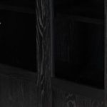 Open cabinet showing internal shelves lit from above with hinges visible