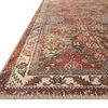 Close-up angled view showing detailed edge stitching and corner of Loren Spice rug