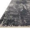 Angled side view showing rug pile texture and soft fringed edge on white background