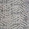 Close-up focus on woven texture and linear pattern in varying gray shades.
