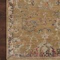 Close-up corner of Giada Gold Multi Rug showing detailed floral border and texture on wood flooring