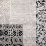 Jaco Trellis cream and gray rug displayed alongside other globally inspired patterned rugs for scale and style comparison