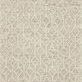 Noelle ivory and black hand-woven rug with intricate geometric patterns and fringe edging