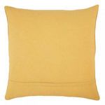 Back side of pillow showing solid mustard yellow cotton fabric with envelope closure
