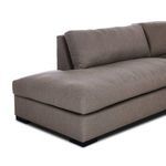 Close-up of spacious chaise cushion and angled backrest on left side of leather sectional