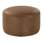 Close-up angle showing fine texture and seam detail on tan leather ottoman