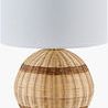 Briec Accent Table Lamp with woven rattan spherical body, white drum shade, and brass iron base and finial