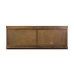 Rear view of sideboard with sliding panel doors and wood finish in darker oak tone