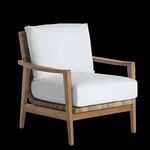 Outdoor lounge chair with natural teak frame, resin wicker detailing, and white cushions, mid-century modern style