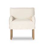 Front view of Addington Slipcover Dining Armchair showing its wide seat and armrests