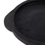 Close-up side angle highlighting tray's rim thickness and handle curvature