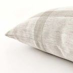 Close-up side angle showing linen texture and detailed weave of beige windowpane pattern